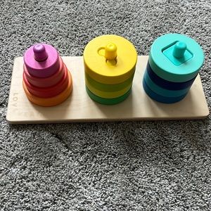 Lovevery colorful wheel spin and push puzzle